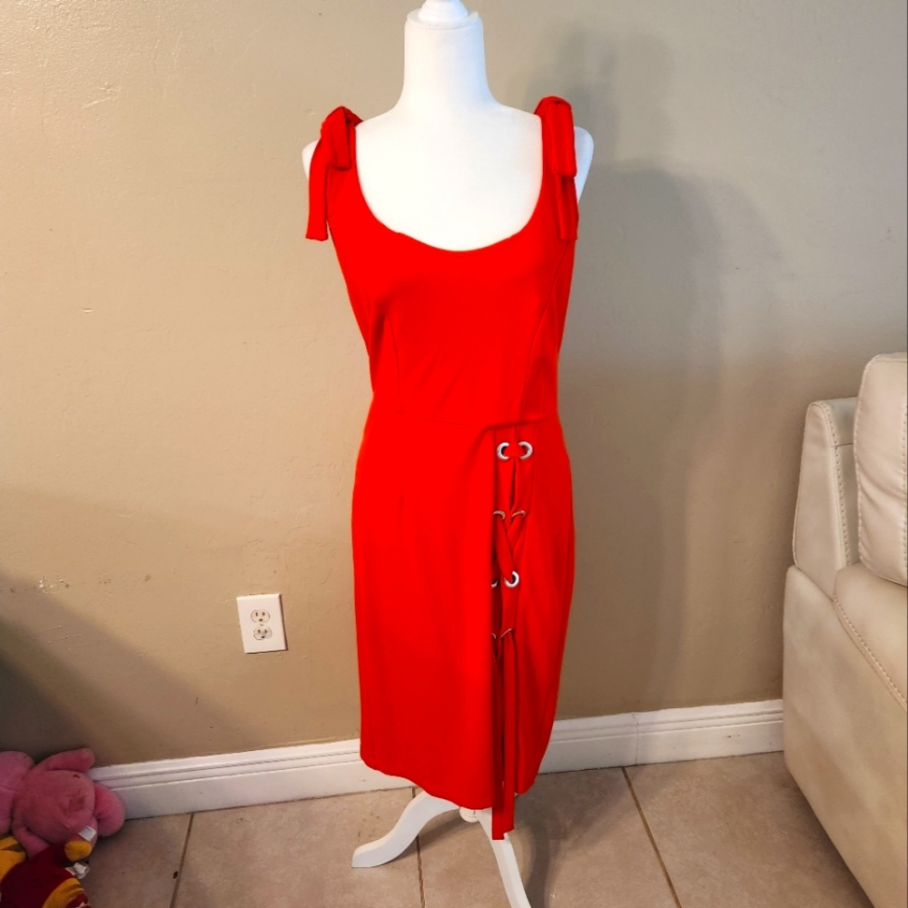 Scoop back Tangerine dress by Venus. 18" pit to pit 40"long